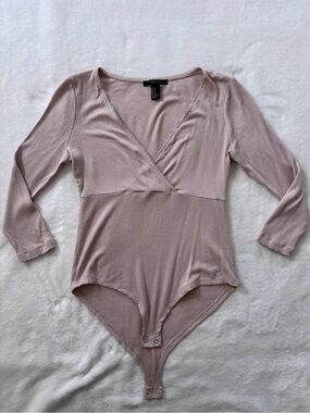 Forever 21 ribbed V-neck long-sleeve bodysuit.